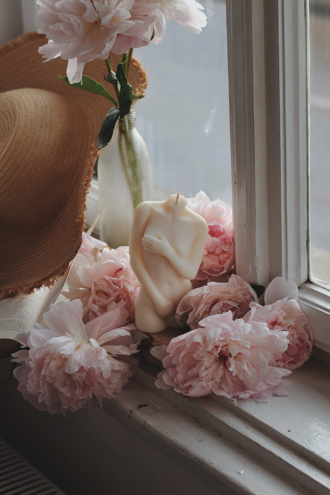 Decorative Candle by the Window 