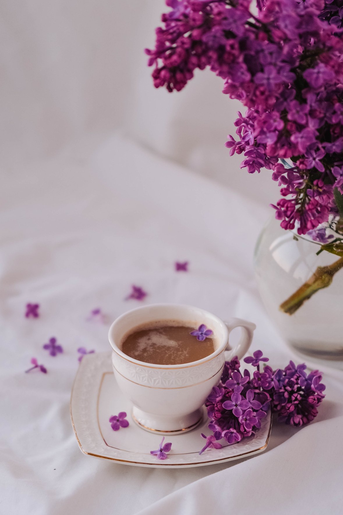 Cup of Coffee with Purple Flowers